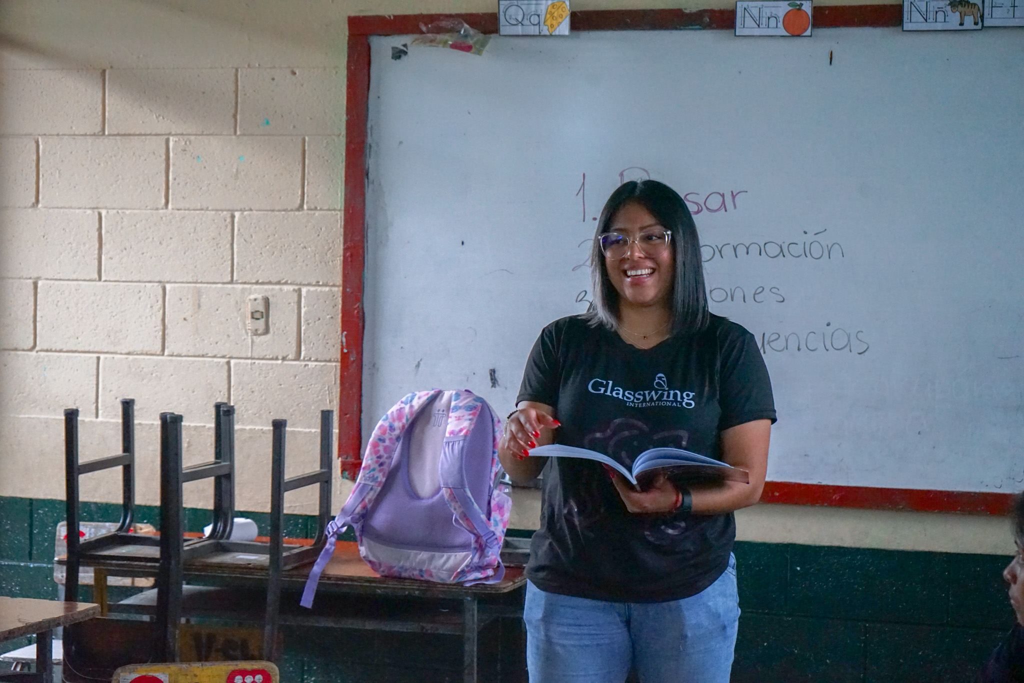 Young people participating in a Glasswing International community activity